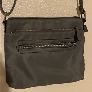 Like-new gray cross body bag